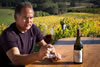 Patrick Stowe enjoying his Pinot Noir at Rimu Grove Vineyard in Nelson